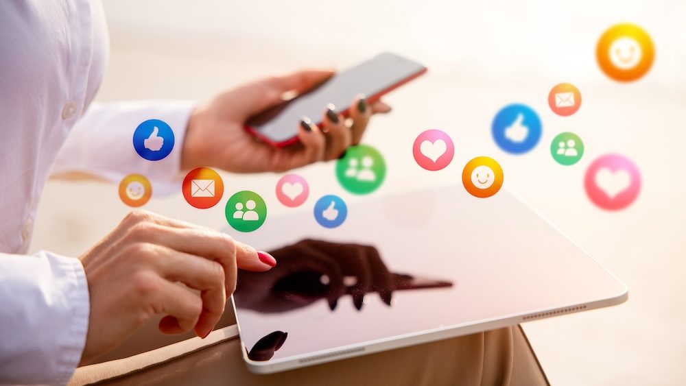 Woman using tech gadgets and apps for everyday life